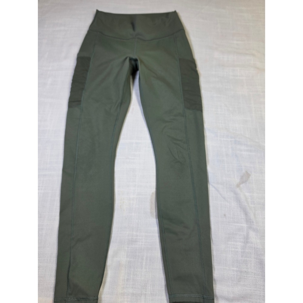 Fabletics PowerHold High Waisted Mesh Pocket Leggings Olive Green 7/8 Length